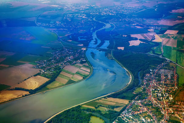 Panoramic view of the Danube river near Bratislava, Slovakia. The view from the plane Panoramic view of the Danube river near Bratislava, Slovakia. The view from the plane blue danube stock pictures, royalty-free photos & images