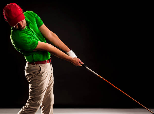 istock Close up Golfer is driving golf ball to green course 1224428353