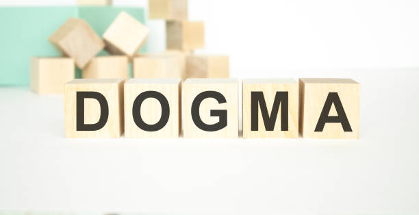 istock DOGMA word written on wood block on a light background 1224428538