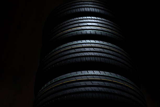 Unused new tires on a dark background