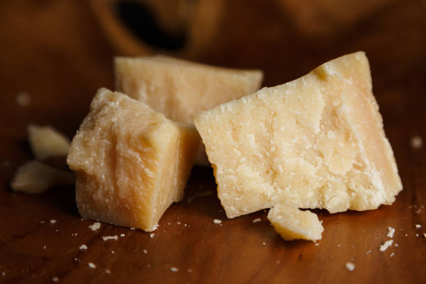 istock Parmesan cheese on a wooden board. 1224435699