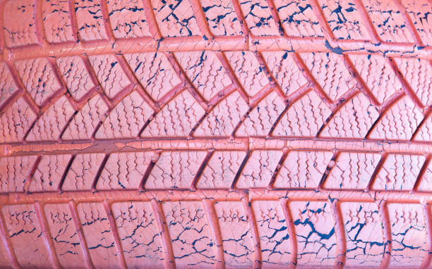 istock Old car tire painted in various colors. 1224437237