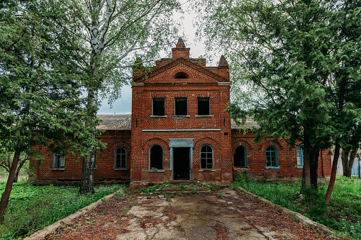 Old abandoned red brick mansion. Former Bikovo manor, Lipetsk region.