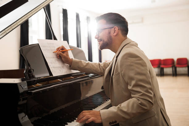 istock Concert Pianist playing piano composing music 1224442788