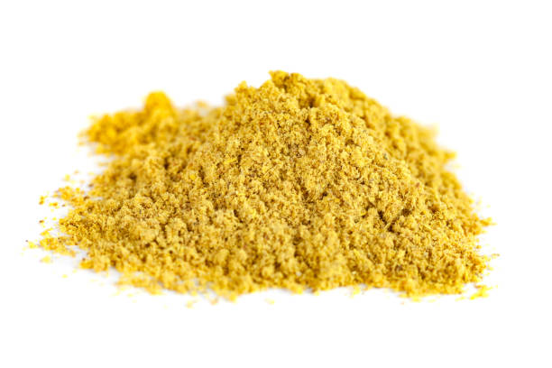 istock Orange curry spice isolated on the white background 1224446613