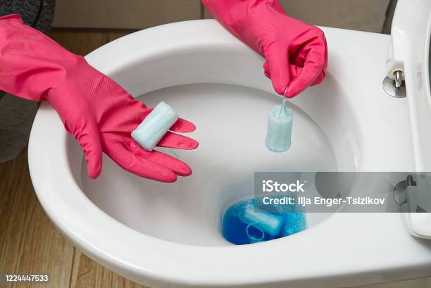 Do Not Throw Foreign Objects Sanitary Pads Tampons Paper Plastic Into The Toilet Closeup Of A Toilet Bowl Clogged Stock Photo - Download Image Now