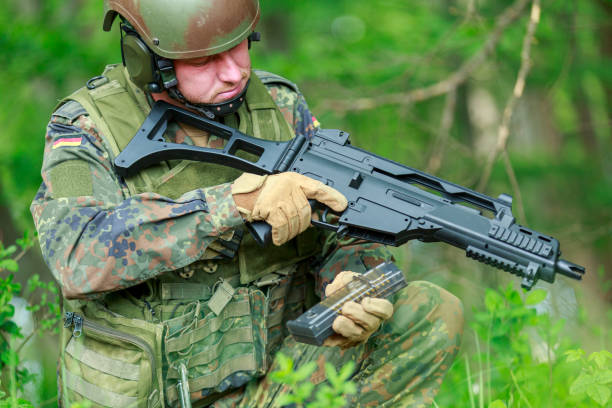 istock German soldier with a german assault rifle 1224448897