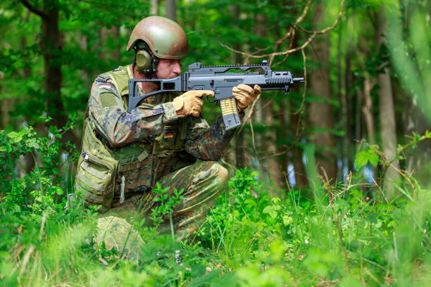 istock German soldier with a german assault rifle 1224448900
