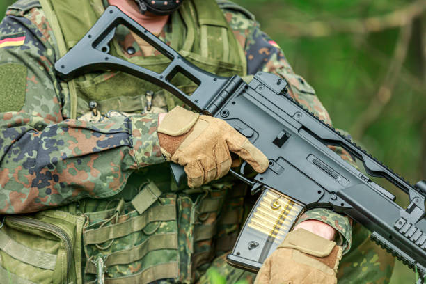 istock German soldier with a german assault rifle 1224448902