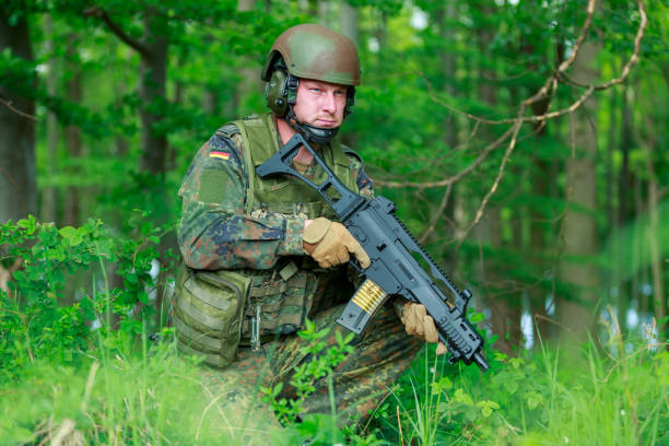 istock German soldier with a german assault rifle 1224448903