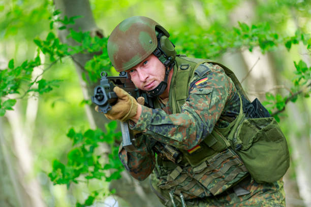istock German soldier with a german assault rifle 1224448914