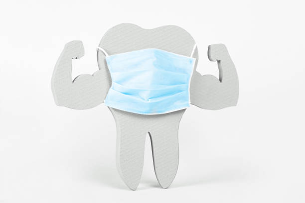 istock White and Very Strong Muscle Healthy Tooth with mask 1224449403