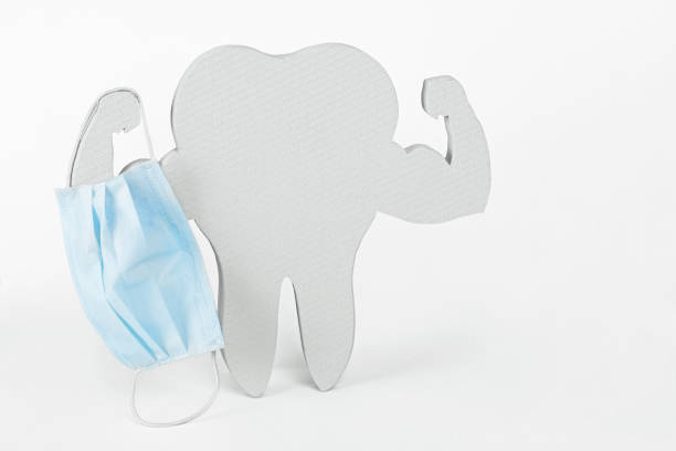istock White and Very Strong Muscle Healthy Tooth with mask 1224449922