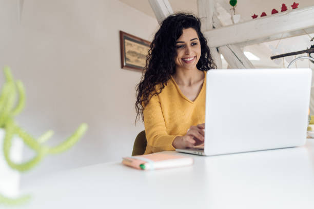istock Beautiful woman working from her home office 1224452597