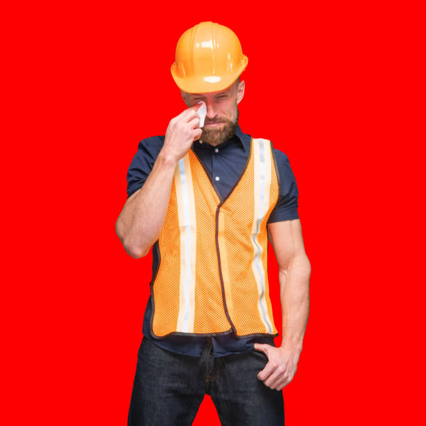 istock Caucasian young male standing in front of colored background 1224454561