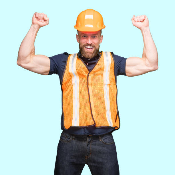 istock Caucasian young male standing in front of blue background 1224454679