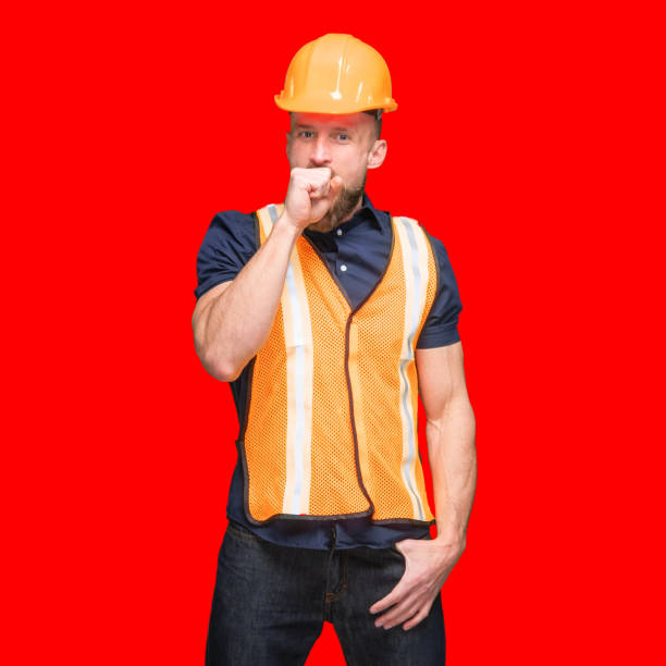 istock Caucasian male standing in front of colored background 1224458332