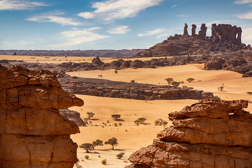 Aerial view of the landscape of the remote Ennedi Mountains (massif) in the Sahara desert, North-East Chad. The Ennedi massif was declared as an UNESCO World Heritage site in 2016.