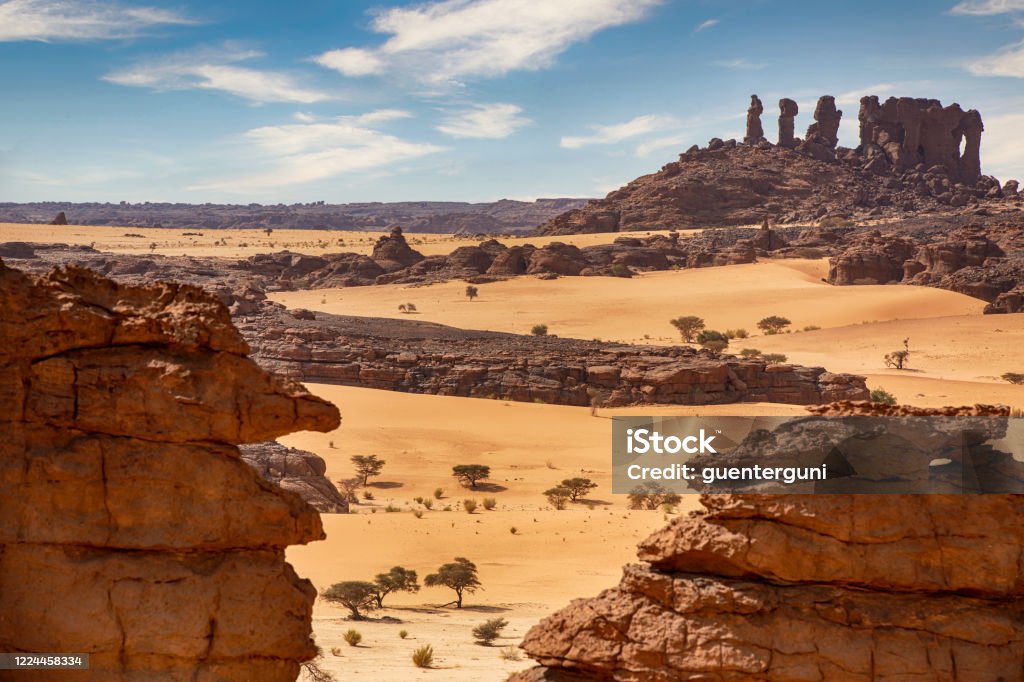 Aerial view of the Ennedi massif, Sahara, Chad Aerial view of the landscape of the remote Ennedi Mountains (massif) in the Sahara desert, North-East Chad. The Ennedi massif was declared as an UNESCO World Heritage site in 2016. Chad - Central Africa Stock Photo