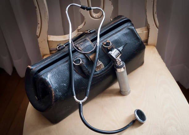 Elder short domain Old Fashioned Doctors Bag And Instruments Stock Photo - Download Image Now  - Doctor's Bag, Old, Old-fashioned - iStock