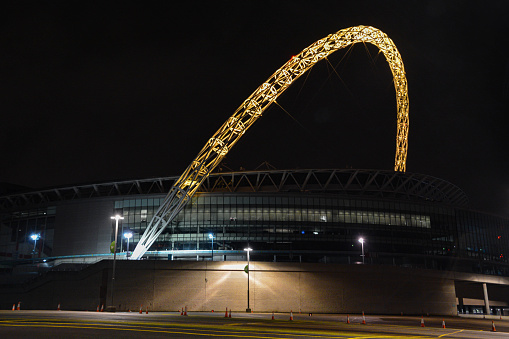 Stadium arch at night, London Borough of Brent, UK