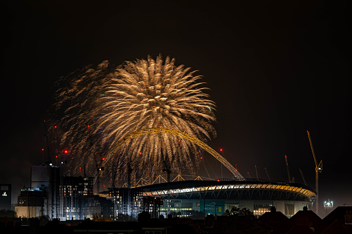 The arch with fireworks nigh in London Borough of Brent, UK.