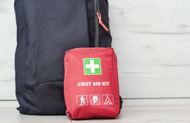 istock Close up view with a backpack along with a first aid kit ready for the mountain trip . 1224462519