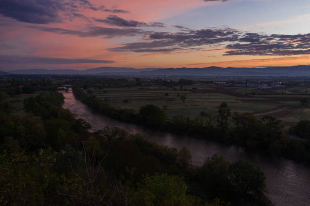 istock Winding river through agricultural fields and beautiful sky 1224465411