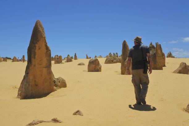 istock Australian man hiking at Pinnacles Desert in Western Australia 1224468556