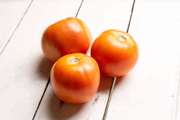 istock Set of tomatoes on white background 1224475307