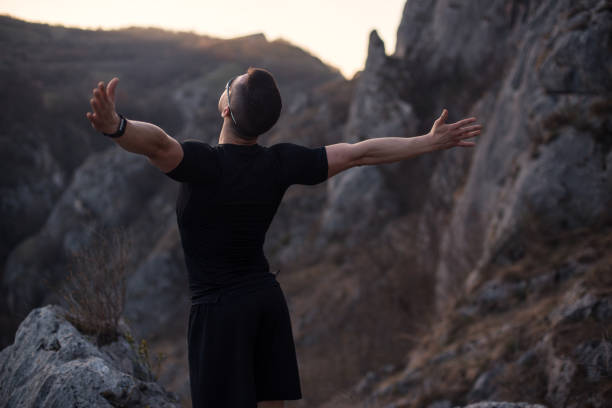 istock Strong man after a hard exercise on the mountain 1224477180