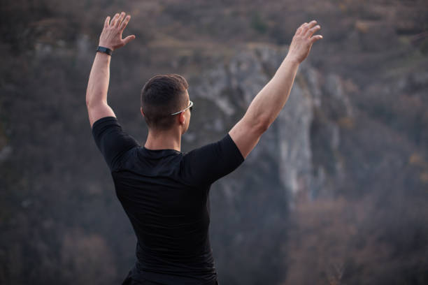 istock Strong man after a hard exercise on the mountain 1224477419