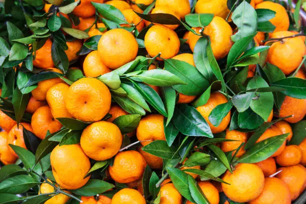 ripe tangerines at the market on street