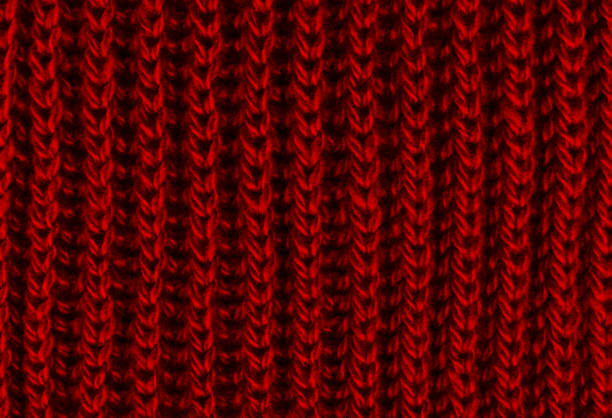 istock Bright red texture knitted wool scarf. Red textile background knitwear. Close-up 1224478149