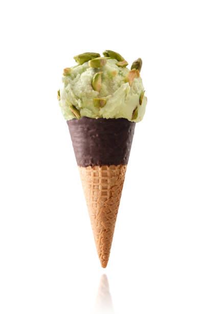 istock Ice cream cone flavored pistachio isolated white 1224478175