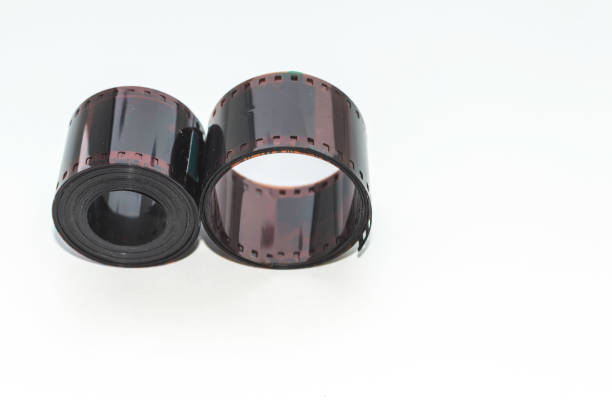 istock film in rolls on a white background. Outdated technology. Retro. 1224480390