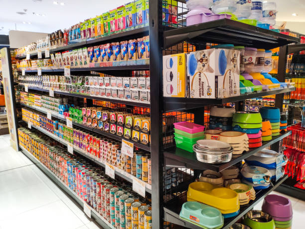 bangkok, thailand - feb 12, 2020.shelf of various displayed for sale in pet shop, feed and pet food products at the mall bangkapi supermarket - pet equipment imagens e fotografias de stock