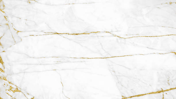 istock White and gold marble luxury wall texture with shine golden line pattern abstract background design for a cover book or wallpaper and banner website. 1224484795