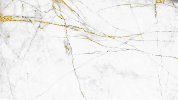 istock White and gold marble luxury wall texture with shine golden line pattern abstract background design for a cover book or wallpaper and banner website. 1224485387