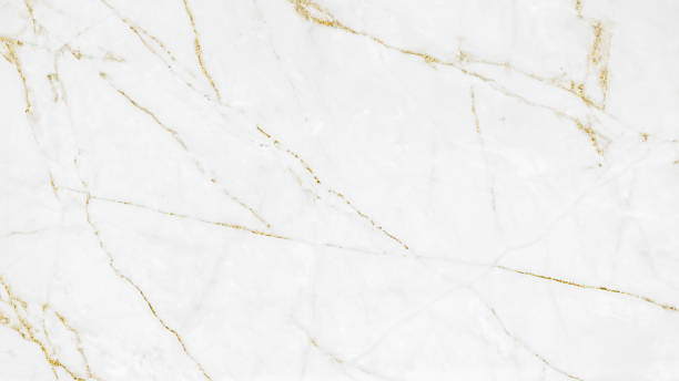 istock White and gold marble luxury wall texture with shine golden line pattern abstract background design for a cover book or wallpaper and banner website. 1224485584