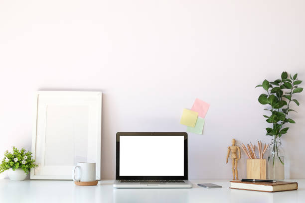 istock Workspace desk and laptop. copy space and blank screen. Business image, Blank screen laptop and supplies. 1224487405