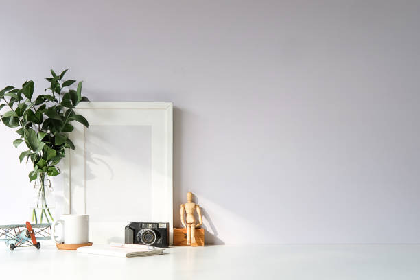 istock Mockup workspace desk and copy space books,plant and coffee on white desk. 1224487939