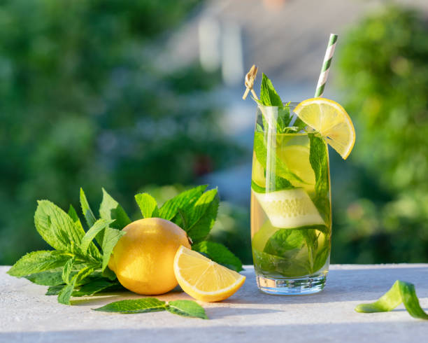 istock Cool refreshing  lemonade or mojito cocktail with lemon, cucumber and mint 1224488870