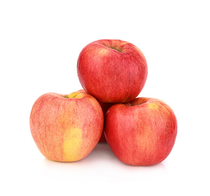 Manzana de miel roja sobre fondo blanco photo