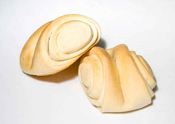 Chilean Homemade rustic fresh bread isolated on white background. Fresh Bread hand made close up. Bakery, food concept.