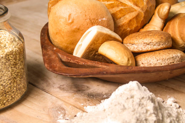 Chilean Homemade rustic fresh marraqueta, hallullas and breads. Fresh Bread hand made close up. Bakery, food concept. Artisanal bakery: Fresh mixed Bun, rolls and ingredients