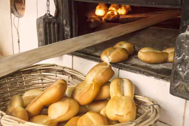 istock Fresh Chilean rustic marraqueta breads in a bakery factory. 1224496898