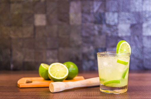 Caipirinha, traditional Brazilian alcoholic drink, typical drink made with sugar, lemon, distilled cane (cachaca) and ice.