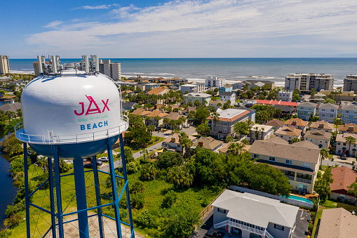 Jacksonville Beach, FL, USA - April 30, 2020: Jax Beach water tower shot with aerial drone