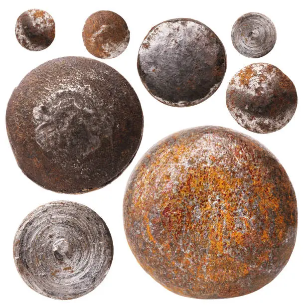 Collection of various rusty rivet heads isolated on white background. Photo Stacking